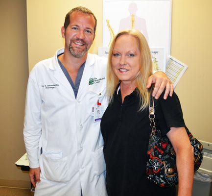 Dr. Eric Oberlander and one of his patients who is finally living free of neck pain!