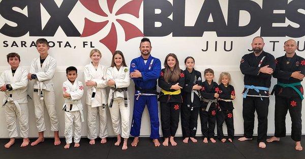 4th Degree Black Belt Sensei Jeremy Harris with some of his kids and teens.