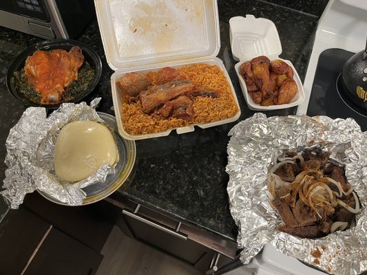 EfoRiro, Fufu, Jollof Rice w/Fish, Sweet Plantains, Beef Suya (From Left to right)