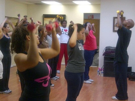 Ladies getting a full body workout with Riley.