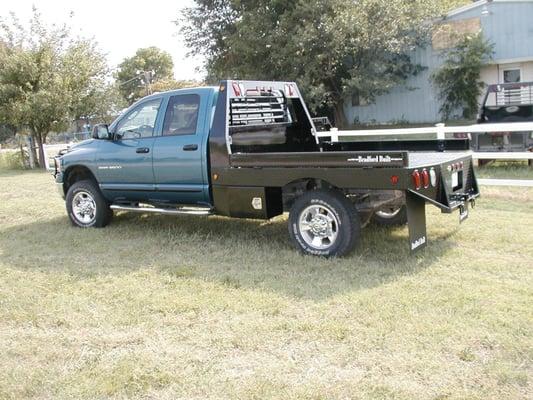 WE STOCK DOZENS OF PICKUP FLATBEDS!