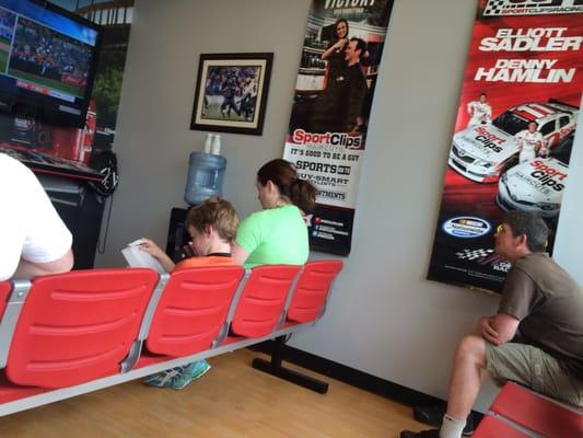 Full waiting room and one 1 hair cutter in sight.