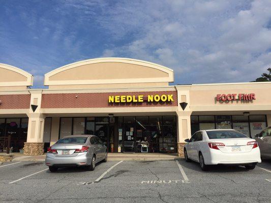 Needle Nook is in the Briar Vista Shopping Center, tucked between Thai Chili and FooTfittR