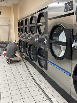 A few of the many sizes of dryers Alex was busy cleaning, whenever he wasn't showing me how to use everything...there's a learning curve!