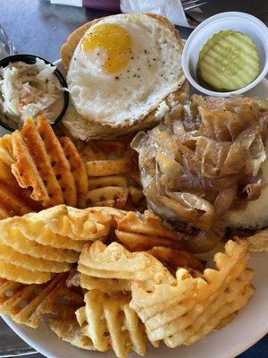 Impossible burger w/gruyere cheese, sautéed onions, pickles, slaw, a fried egg and waffle fries (spuds)