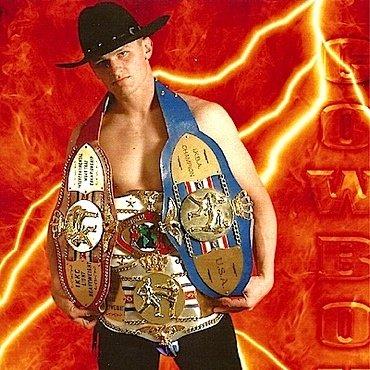 Heath " Cowboy" Harris with his Championship Belts