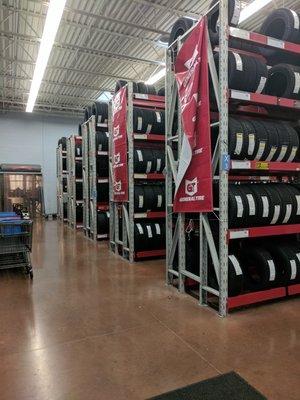 Tire storage and display area in automotive area.