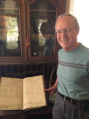 My dad pointing at his great grandfather's name in the guestbook from May 20, 1882 on May 20, 2017!