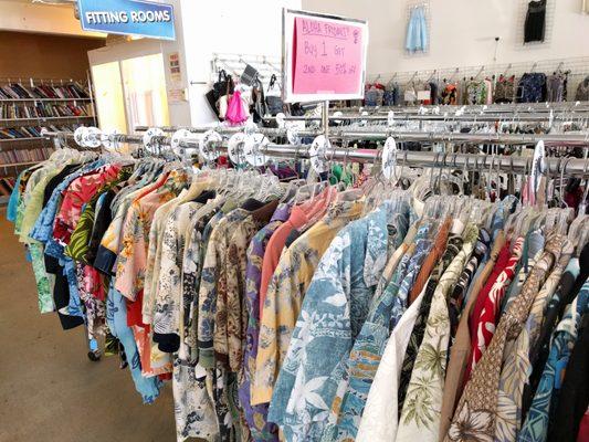 Lots of men's and women's aloha shirts.