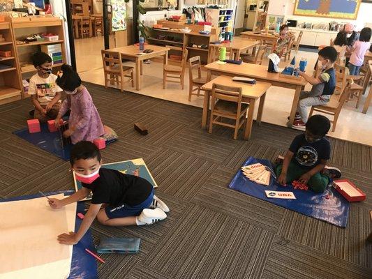 Children busy doing their work in the morning