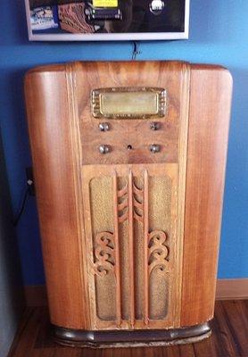 This nice General Electric console radio is in one of the rooms.