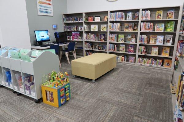 Children's AWE station and computer. Puzzles and other Stay & Play items available.