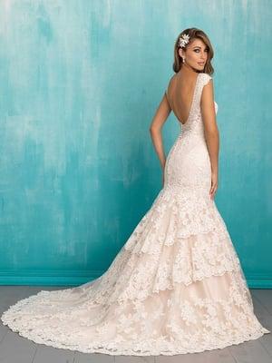 Favorite details of this gown include the delicately beaded cap sleeves and tiered lace train. || Allure 9311 (Available in w...