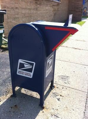 There's a drop box in front of the post office.