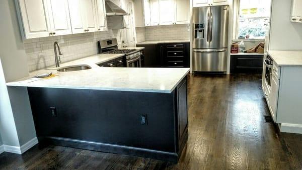 Modern/contemporary! two-tone cabinetry! Walnut floors.