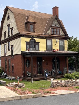 Exterior painting and wood repairs done on an 1895 Tudor style house.   Beautiful old unique style here.