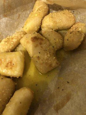 Parmesan bread bites swimming in oil! Disgusting!