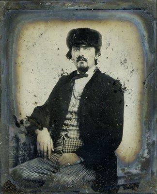 The original 1860's ambrotype expertly removed from its case and scanned.