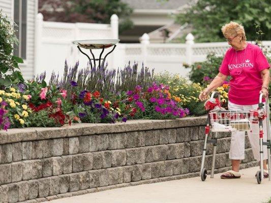 Kingston Care Center of Sylvania Resident Enjoying the Courtyard