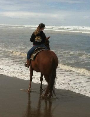 Hannah riding in the Oregon surf