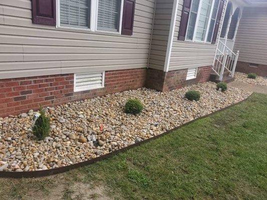 Add gravel and a few plants including edging