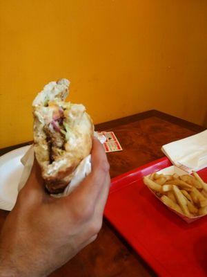 Doner Kabab on bread with fries.