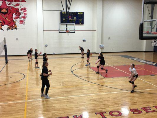 One of MVP Volleyball Club's Plano Premier League Teams warming up