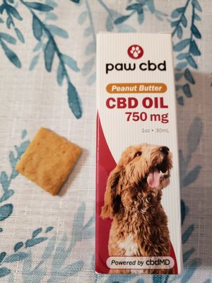 CBD oil 750mg Peanut butter flavor and a baked cheese dog treat.