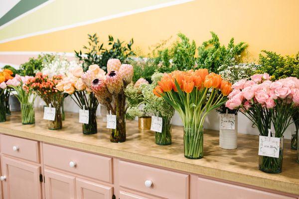 We offer custom made flower arrangements for delivery or arranged at our flower bar.