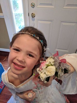 Daughter show off corsage.