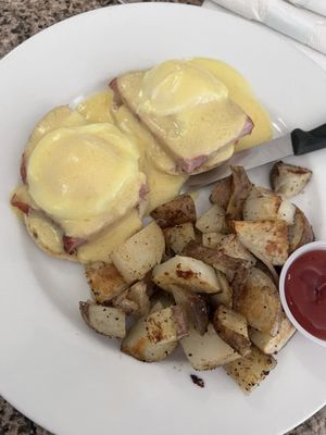 Eggs Benedict and home fries