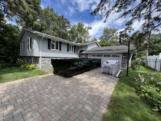 Dumpster and materials delivered to this beautiful home the day before work starts.