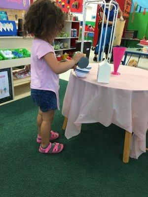 My daughter playing while I talk to associates.