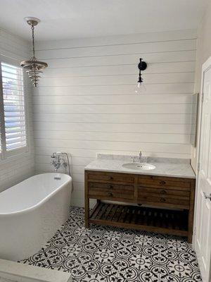 Shiplap installation in bathroom