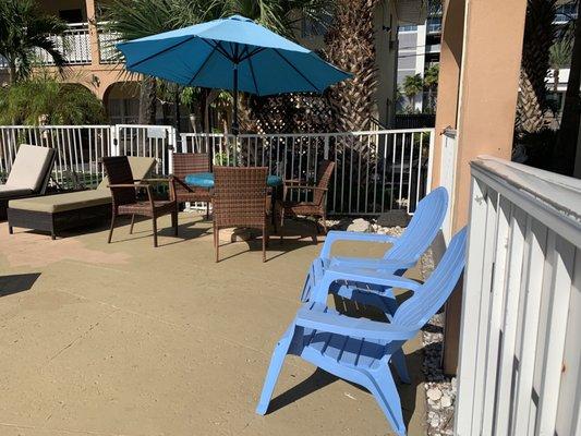 Seating area around swimming pool