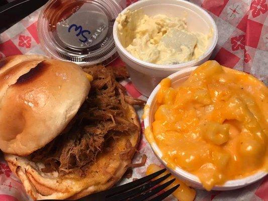 Brisket combo with mac n cheese, potato salad, and sweet heat BBQ sauce.