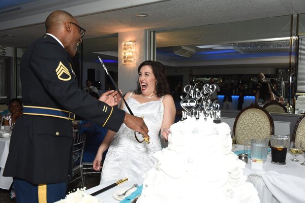 Wedding Day. The Groom cuts the cake!