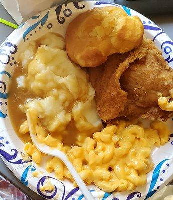 Chicken thigh, mac & cheese, mashed potatoes, and a biscuit.