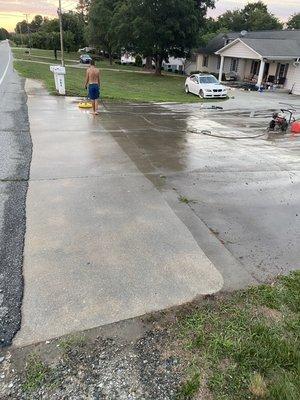 Before and after while cleaning driveway