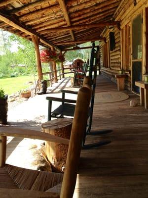 The lodge front porch rocking chairs are a great place to relax unwind and watch hummingbirds literally feet away