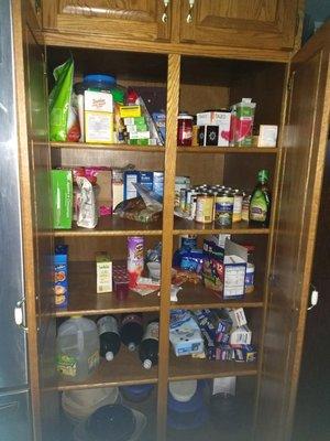 An after photo of a hoarder's thoroughly cleaned and organized kitchen!