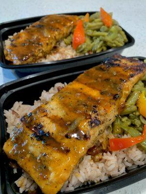 Jerk salmon over rice & peas with sautéed green beans