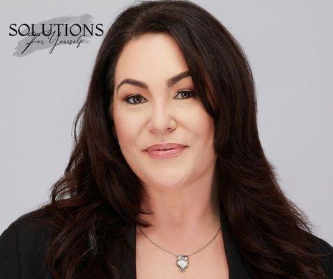 Nicole DiCroce, an intuitive strategist and visionary planner dedicated to helping clients achieve their goals.