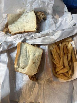 Two fish sandwiches and fries