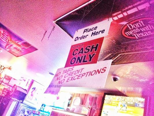 Big red sign that says "CASH ONLY" and people still go up there with their cards.