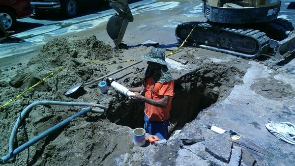 Repairs being done on apartment water main.