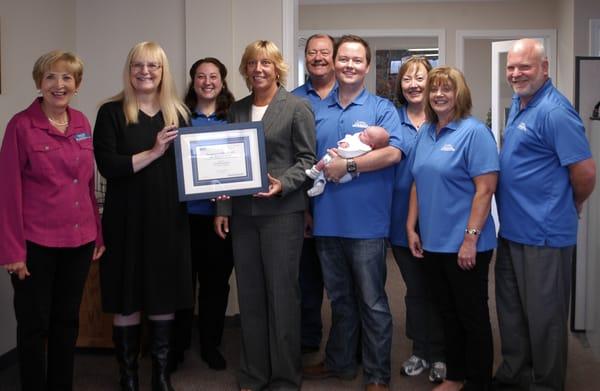 Safeco Insurance presenting a grant to the Sequim Free Clinic on behalf of Castell Insurance in August 2013