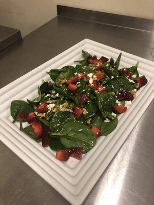 Fresh spinach, strawberries, walnuts, tossed with raspberry vinaigrette.