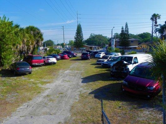 Our car lot where security is a priority. Fenced in with barbed wire and a lock on the gate. You don't have to worry about a thing!