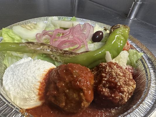 Rama meatballs and house salad topped with italian longhot